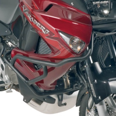 Motocicleta vermelha com detalhes pretos e texto VARADERO na lateral