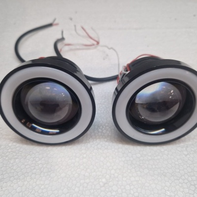 Par de luzes redondas com lentes esféricas e aro branco para automóveis