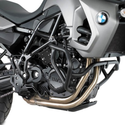Moto BMW cinzenta com motor e quadro pretos e tubos de escape em aço inoxidável