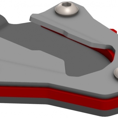 Peça metálica cinzenta com base vermelha e parafusos prateados