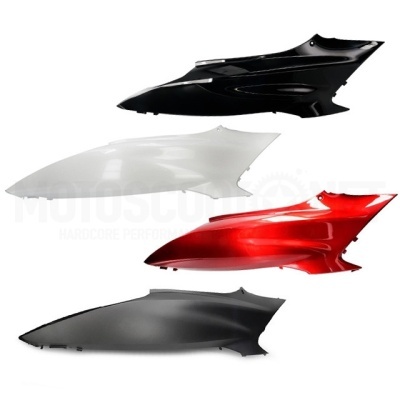 Quatro carenagens laterais de moto em várias cores sobre fundo branco