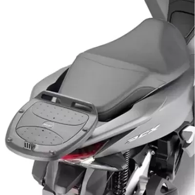 Moto cinzenta com suporte traseiro para bagagem e texto PCX