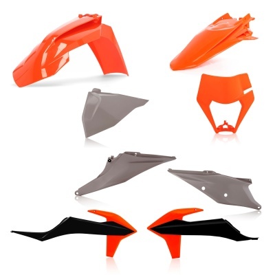 Peças plásticas para mota em laranja, cinza e preto isoladas