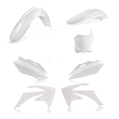 Conjunto de peças de plástico brancas para motocicleta sobre fundo branco