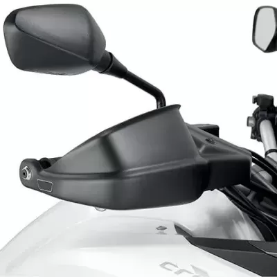 Espelho retrovisor e proteção de mão preto numa moto branca