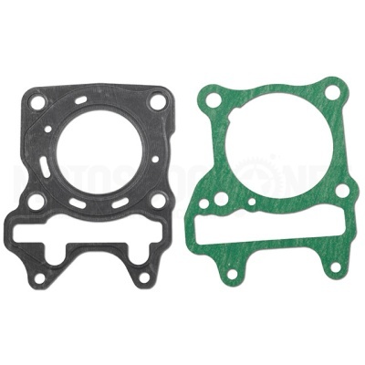 Duas juntas de motor, uma preta e outra verde, sobre fundo branco