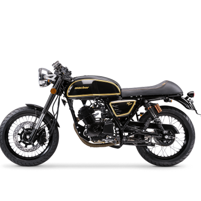 Motocicleta clássica preta com detalhes dourados e suspensão laranja