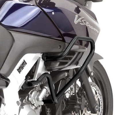 Parte lateral de moto azul escura com proteção preta e rodas com disco de travão