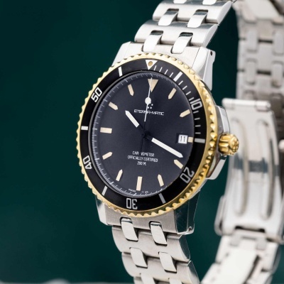 Relógio ETERNA-MATIC com bracelete de aço e mostrador preto