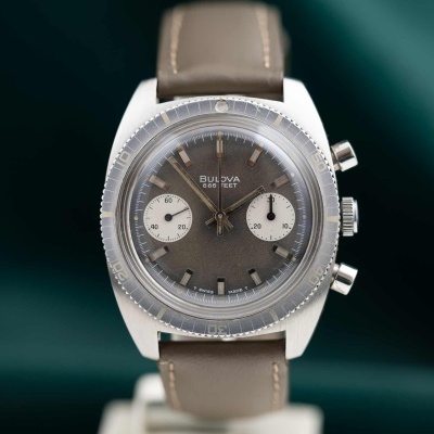 Relógio Bulova chronograph cinza com pulseira castanha em couro