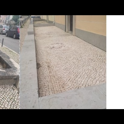 Passeio com calçada portuguesa em tons claros e muros baixos de pedra