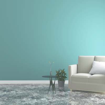 Sala com sofá bege, mesa preta pequena, planta e parede azul clara