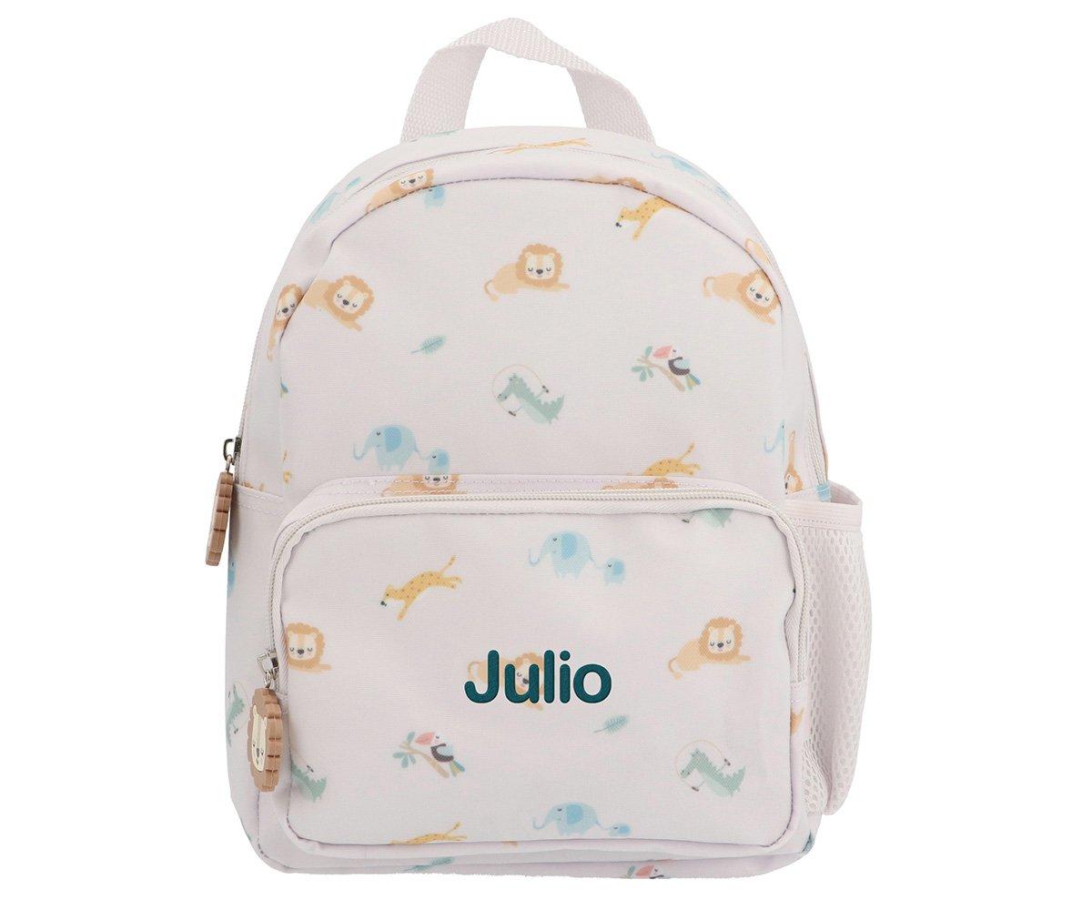 Mochila infantil branca com padrão de animais coloridos e nome 'Julio'