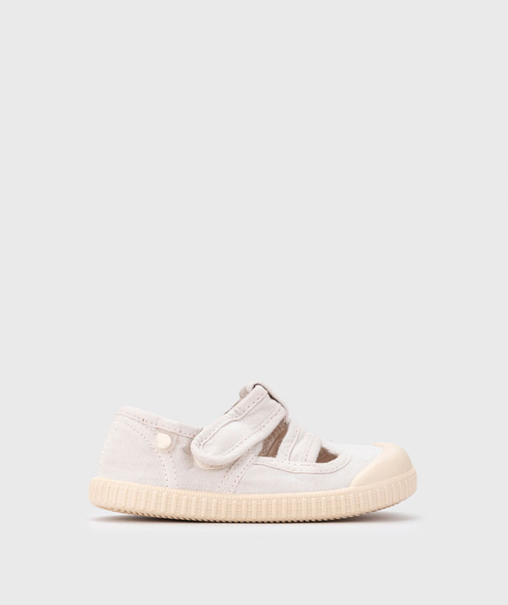 Sapato infantil branco com sola creme e fecho velcro