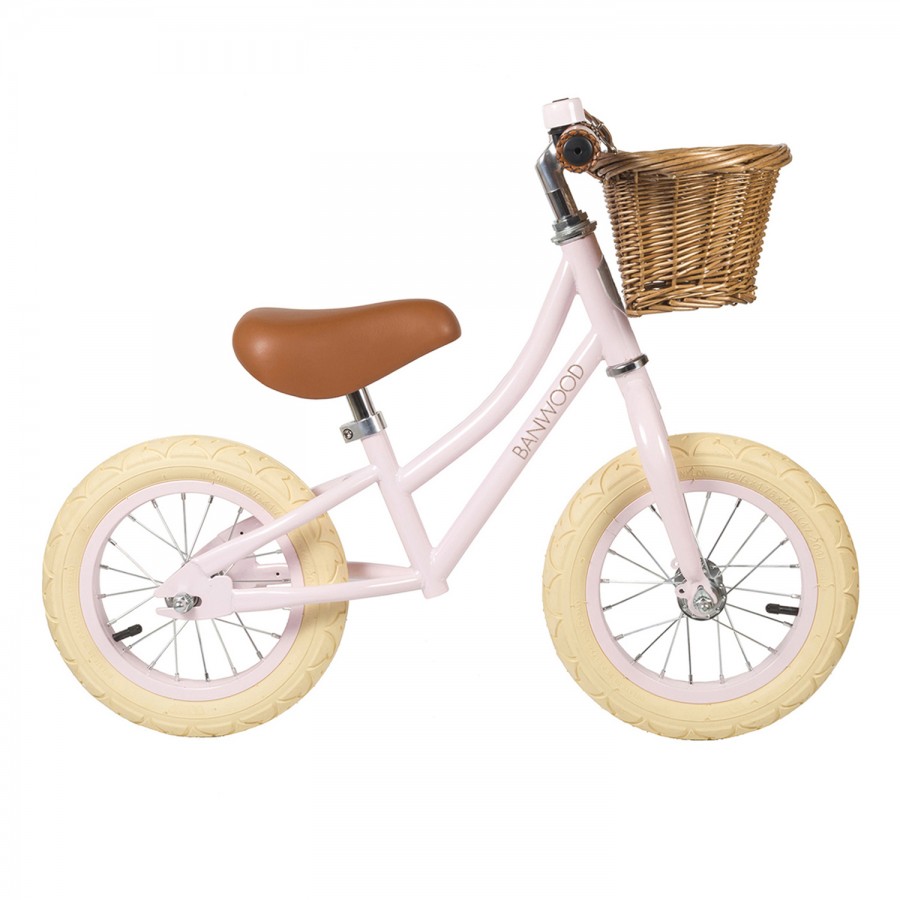 bicicleta infantil rosa com cesto de vime
