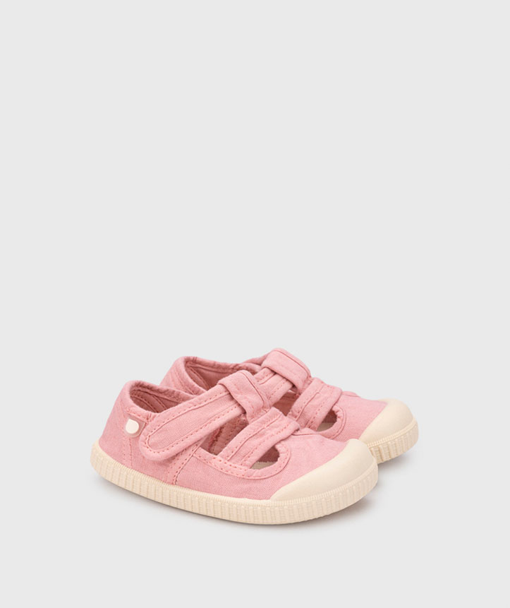 Sapatilhas cor-de-rosa para criança com fecho velcro e sola creme