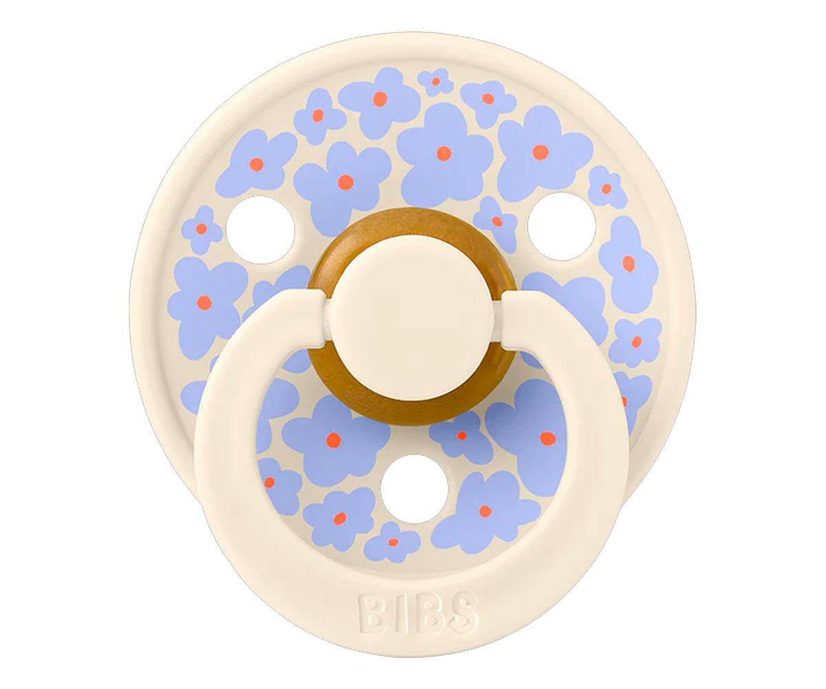 Chupeta BIBS branca com flores lilás e centro castanho.