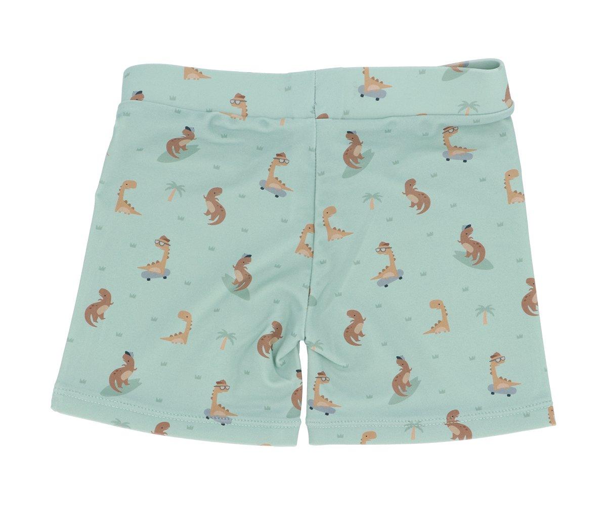 Calções azuis claros com estampado de dinossauros e palmeiras