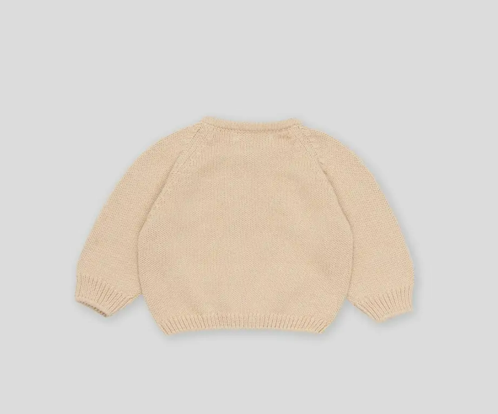 Camisola de malha bege para bebé vista de costas