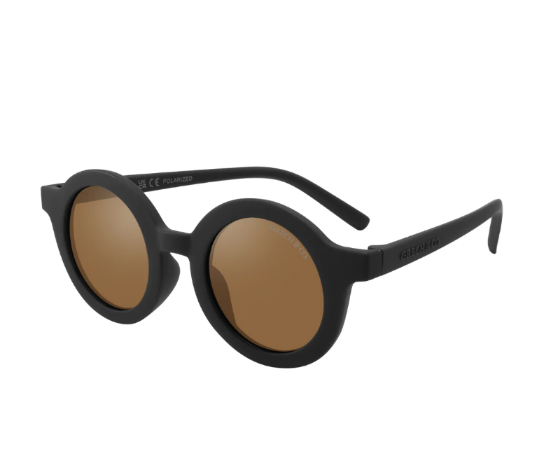 Óculos de sol redondos com armação preta fosca e lentes castanhas polarizadas