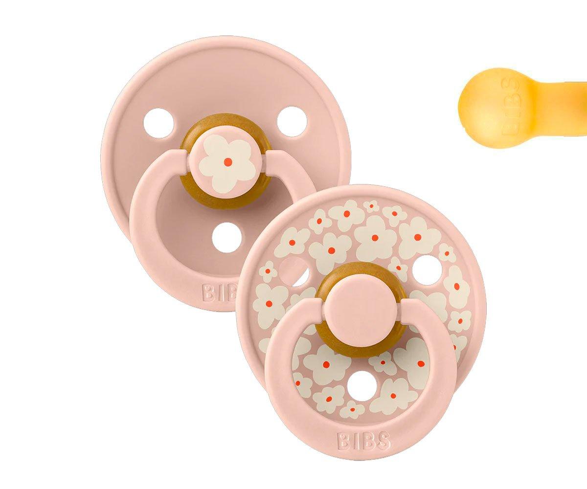 Dois chupetas BIBS rosa com padrão floral e orifícios de ventilação