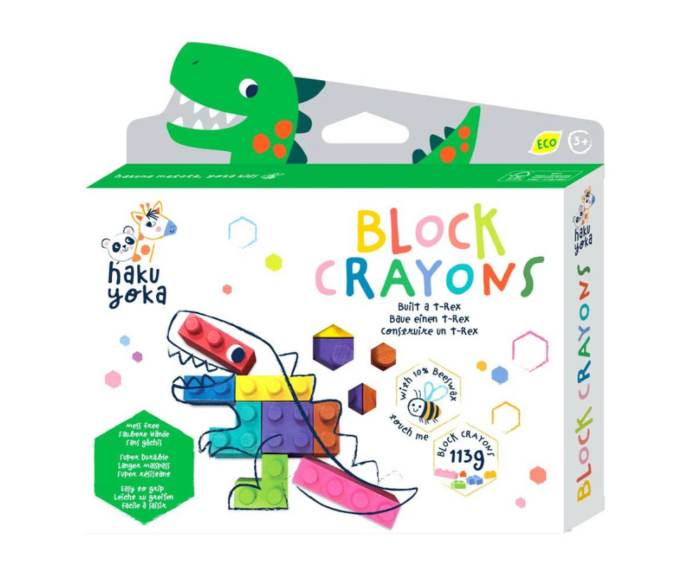 Caixa branca de giz de cera em bloco com imagem colorida de dinossauro T-Rex feita de blocos coloridos