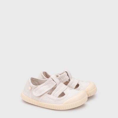 Sapatos de criança bege claro com fecho de velcro e sola creme
