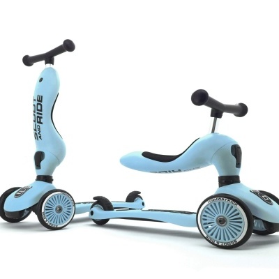 Trotinete infantil azul de três rodas com guiador preto e assento ajustável.