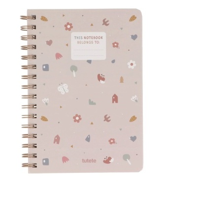 Caderno espiral com capa bege clara e desenhos coloridos pequenos