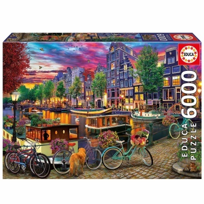 Caixa de quebra-cabeças EDUCA 6000 peças com imagem de canal ao entardecer e bicicletas.