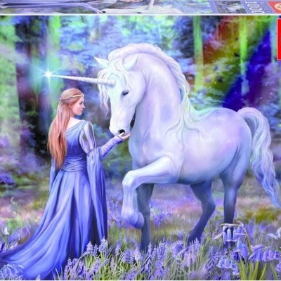 Caixa de puzzle com 1000 peças mostrando mulher de vestido azul e unicórnio branco na floresta