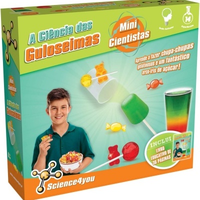 Caixa do kit de ciência A Ciência das Guloseimas Mini Cientistas com menino a segurar guloseimas