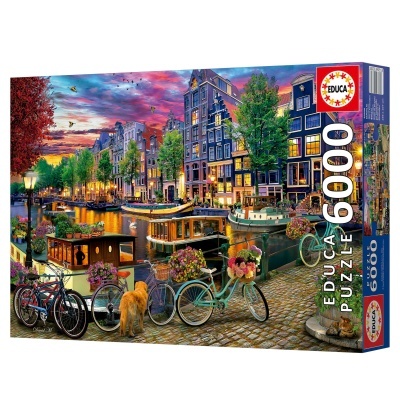 Caixa de puzzle EDUCA 6000 peças com imagem de canal urbano à entardecer.