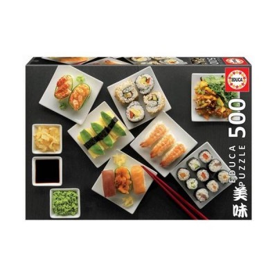 Caixa de puzzle com imagem de várias peças de sushi coloridas sobre pratos brancos.