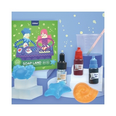 Kit para fazer sabão com moldes em forma de nariz, estrela-do-mar e concha, frascos de líquidos coloridos e embalagem verde da marca mideer