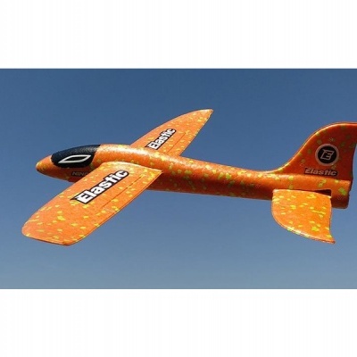 Avião de brinquedo laranja em espuma com texto Elastic no céu