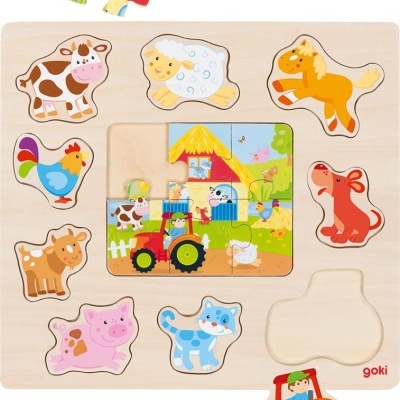 Puzzle de madeira com peças de animais da quinta e trator coloridos