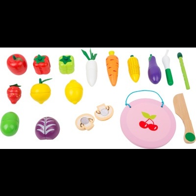 Brinquedos de legumes e frutas coloridos em plástico e madeira com tábua rosa e faca de madeira
