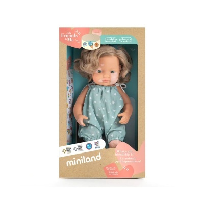 Boneca loira de macacão verde com corações em embalagem Miniland