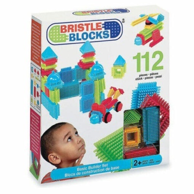 Caixa BRISTLE BLOCKS com 112 peças coloridas para crianças, mostrando blocos montados e retrato de criança.