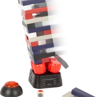 Jogo de blocos empilháveis coloridos com base preta, botão vermelho e dado sobre fundo branco