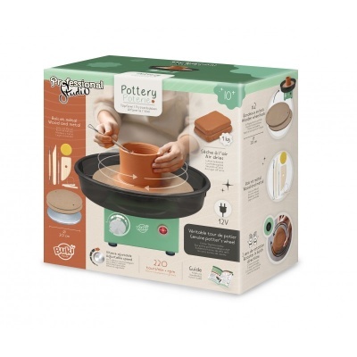 Caixa do kit profissional de olaria com roda de oleiro e materiais de argila