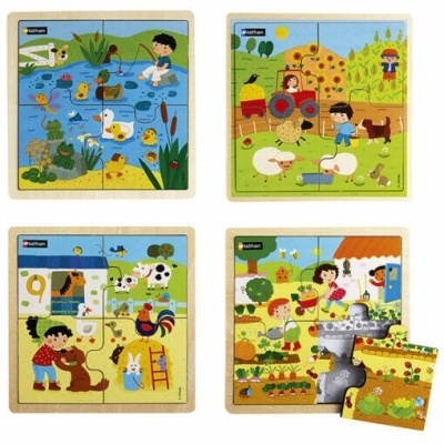 Quatro puzzles de madeira Nathan com cenas rurais coloridas e peça removida