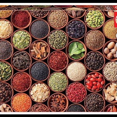 Caixa de puzzle EDUCA 1500 peças com imagens de especiarias em tigelas.