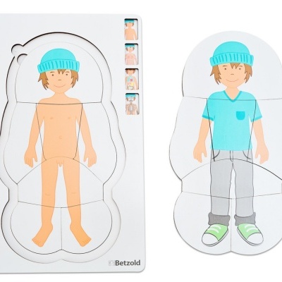 Puzzle de criança em madeira com partes do corpo nu e vestido