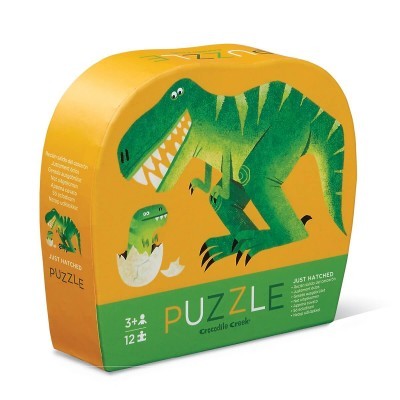 Caixa amarela e verde com puzzle infantil de dinossauro de 12 peças