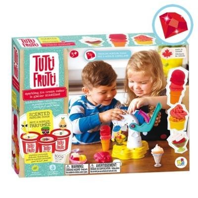 Caixa do brinquedo Tutti Frutti para fazer gelados com imagens de crianças e texto em várias línguas
