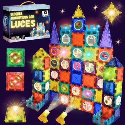 Blocos magnéticos coloridos com luzes formando castelo e embalagem com texto em espanhol