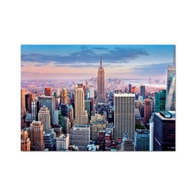 Fotografia panorâmica da cidade com arranha-céus e o Empire State Building ao pôr do sol