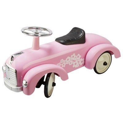 Brinquedo carro infantil cor-de-rosa com decoração floral branca e assento preto